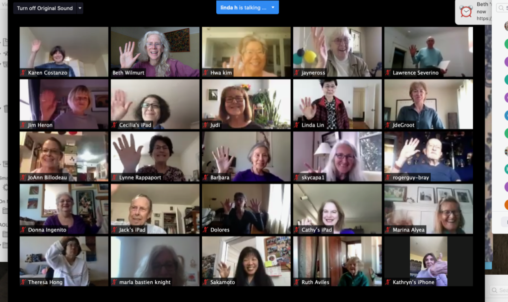 The Hello Chorus waving on a Zoom call. [Photo courtesy of Beth Wilmurt].